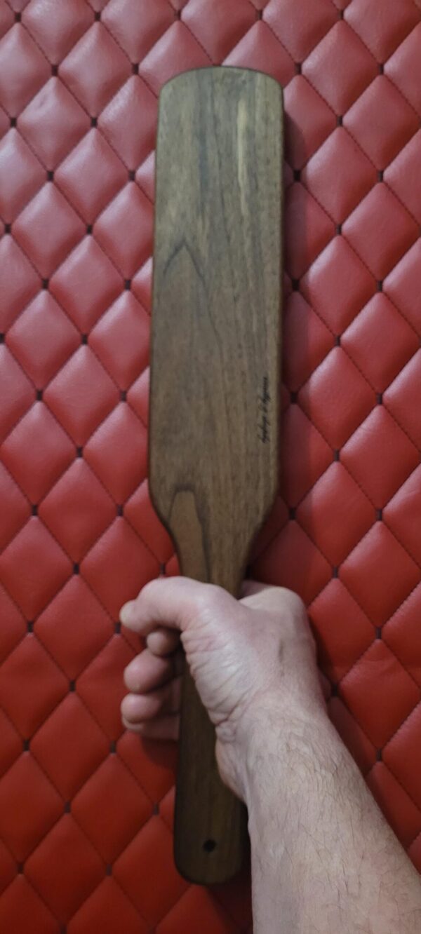 Thick Thuddy Walnut BDSM Gear paddle for impact play. Stingy for OTK kink