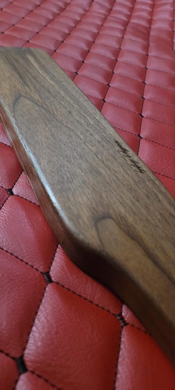 Thick Thuddy Walnut BDSM Gear paddle for impact play. Stingy for OTK kink