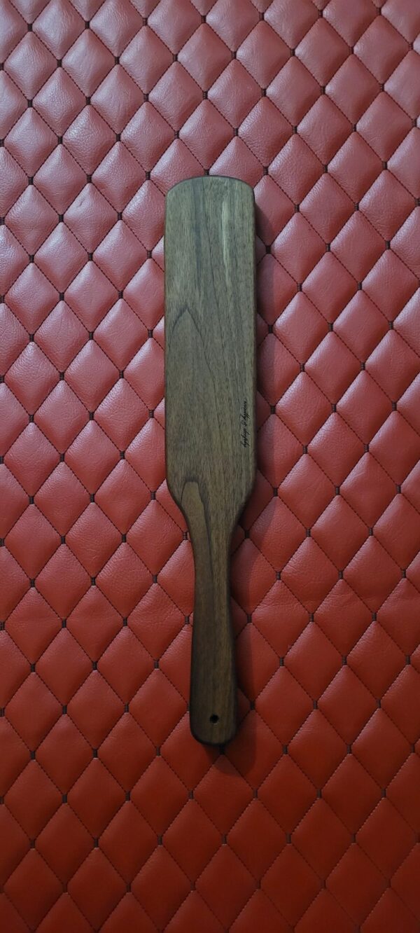 Thick Thuddy Walnut BDSM Gear paddle for impact play. Stingy for OTK kink