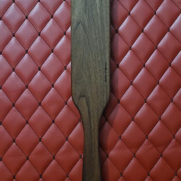 Thick Thuddy Walnut BDSM Gear paddle for impact play. Stingy for OTK kink