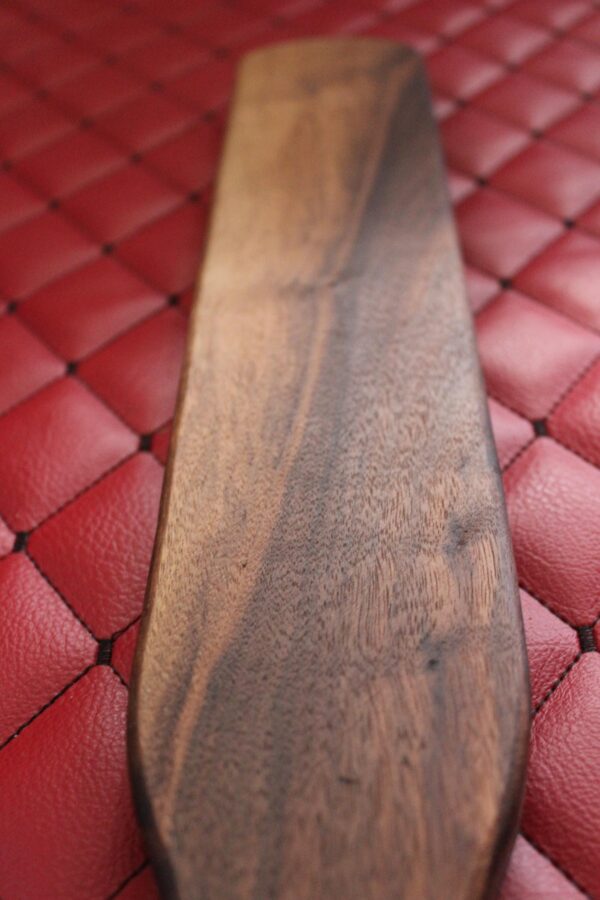 Long Walnut BDSM Gear paddle for impact play. Stingy for bench work