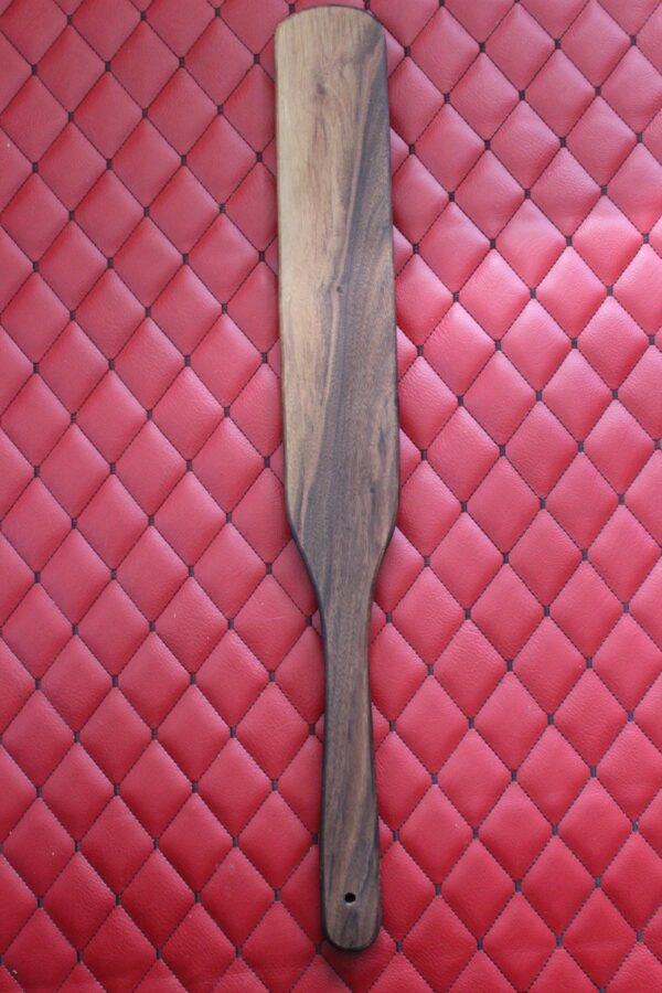 Long Walnut BDSM Gear paddle for impact play. Stingy for bench work