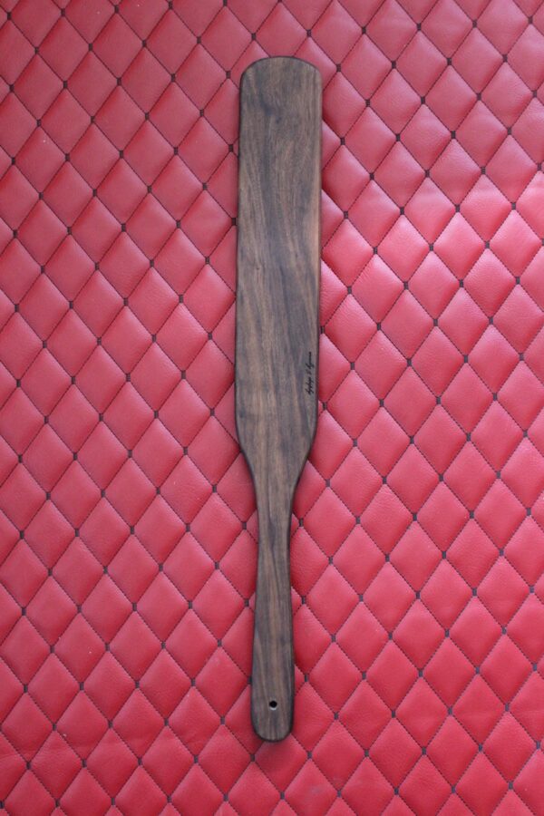 Long Walnut BDSM Gear paddle for impact play. Stingy for bench work