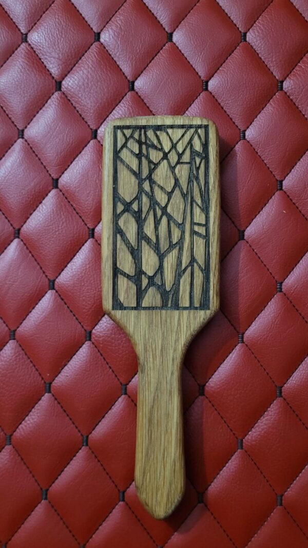 Small Oak BDSM paddle for spanking and impact play. Hairbrush styled design. Great for OTK or role play.