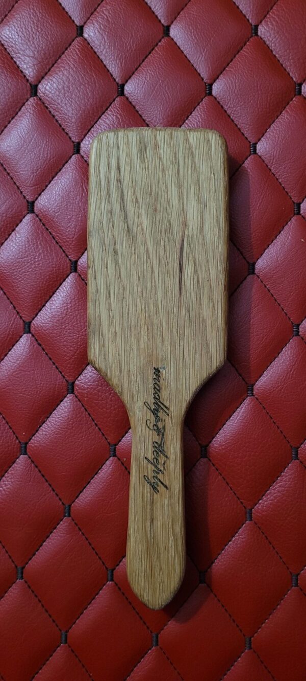 Small Oak BDSM paddle for spanking and impact play. Hairbrush styled design. Great for OTK or role play.