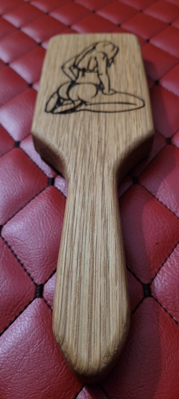 Small Oak BDSM paddle for spanking and impact play. Hairbrush styled design. Great for OTK or role play.